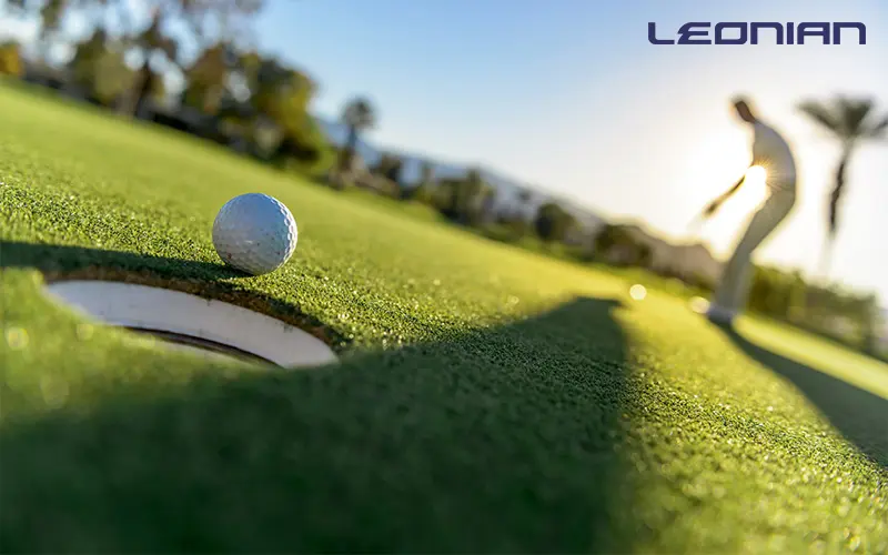 A man playing golf on a golf course