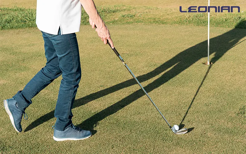 golfer playing golf.